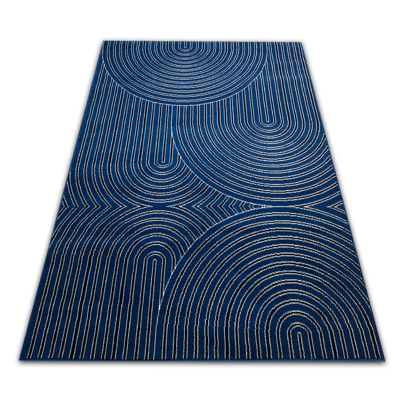 Jakie kolory dywanów najlepiej pasują do granatowej kanapy – odkryj idealne style dla swojego wnętrza