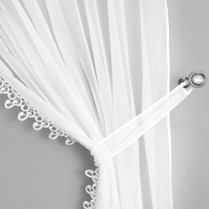 Praktyczność i funkcjonalność firan podpinanych